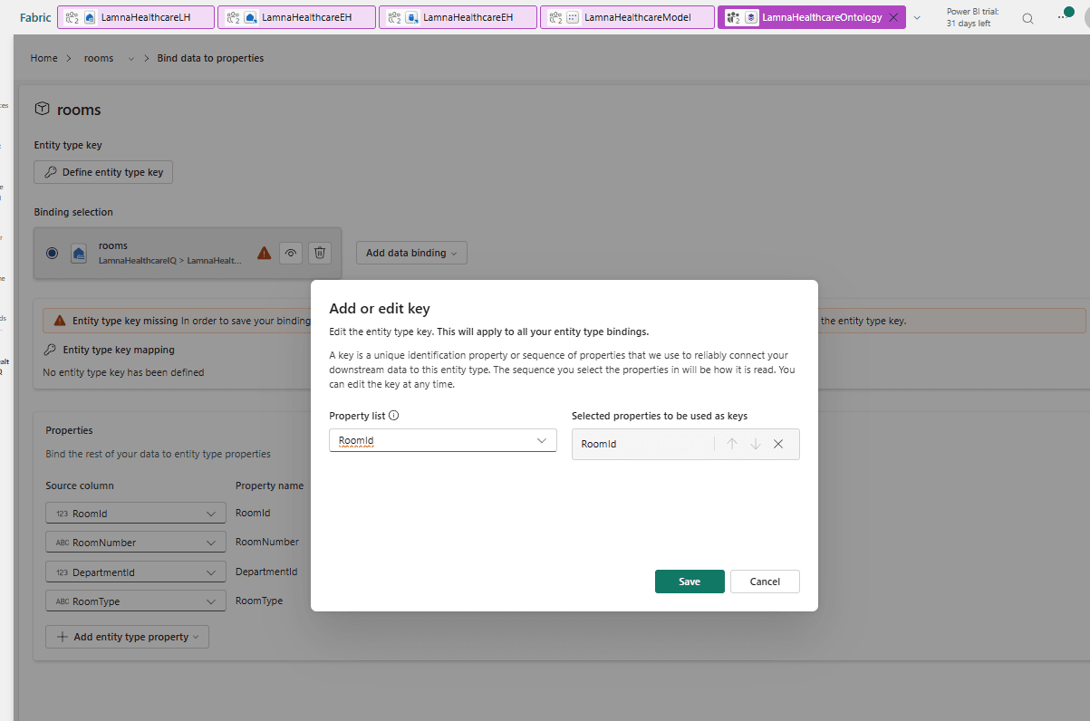 The rooms entity type's Bind data to properties page showing an Entity type key missing warning, with the Add or edit key dialog open and RoomId chosen from the Property list